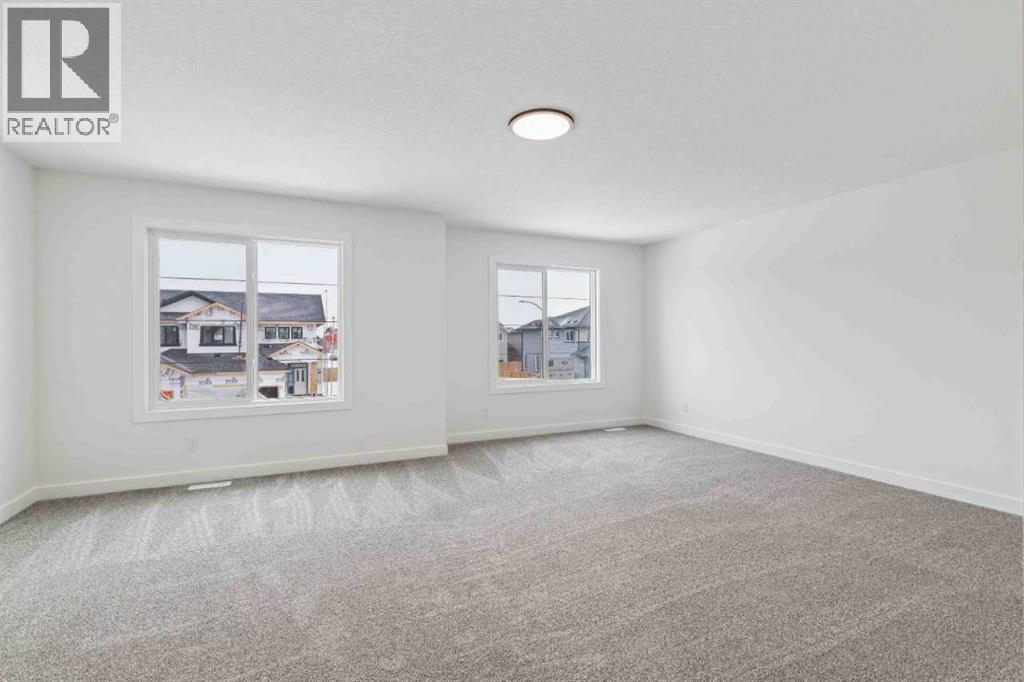 146 Northern Lights Crescent, Langdon, Alberta  T0J 1X2 - Photo 18 - A2283455