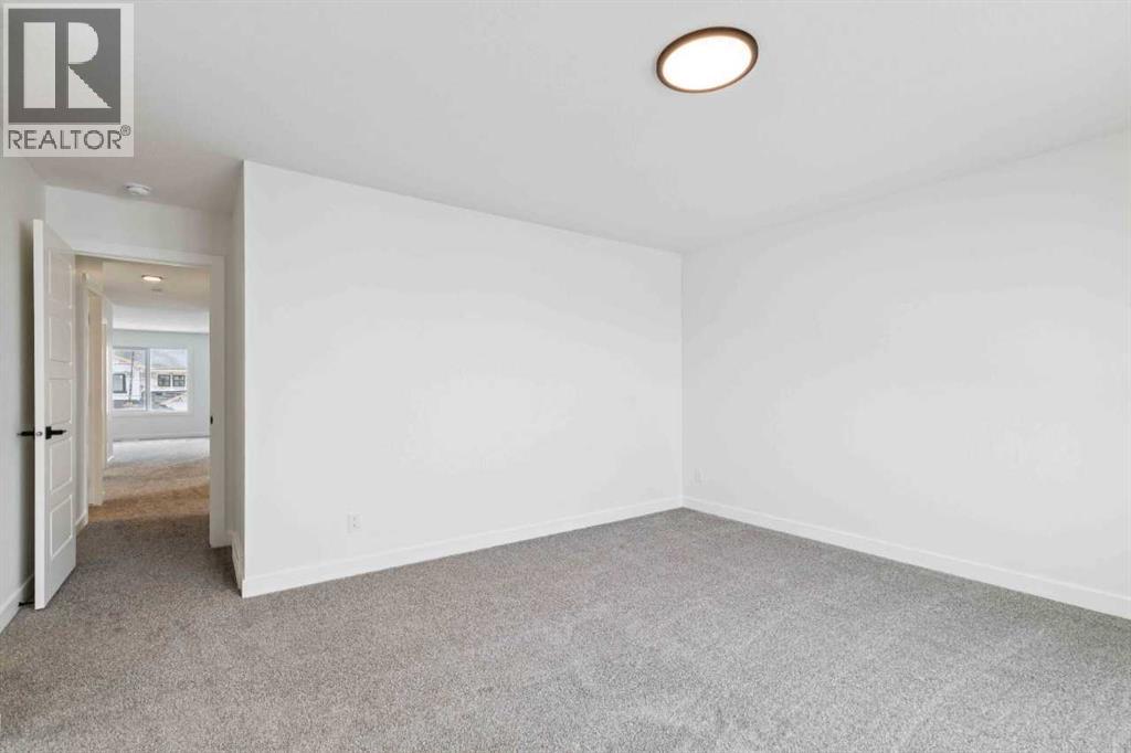 146 Northern Lights Crescent, Langdon, Alberta  T0J 1X2 - Photo 23 - A2283455