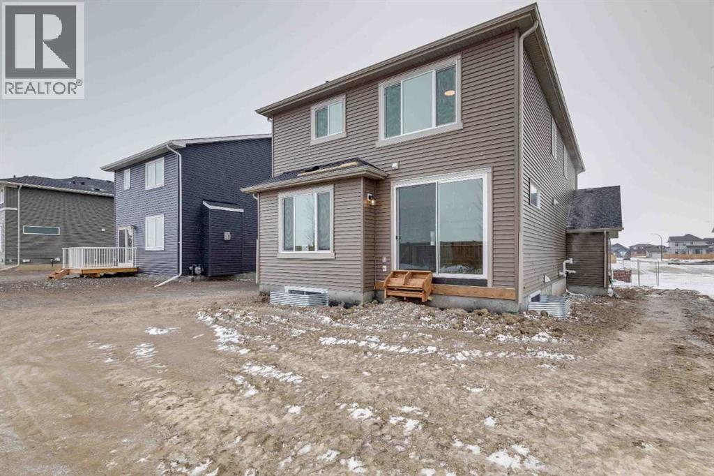 146 Northern Lights Crescent, Langdon, Alberta  T0J 1X2 - Photo 34 - A2283455