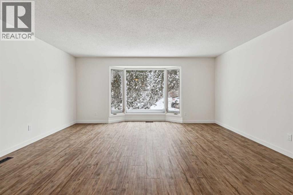 220 Templeby Place Ne, Calgary, Alberta  T1Y 5H1 - Photo 3 - A2281106