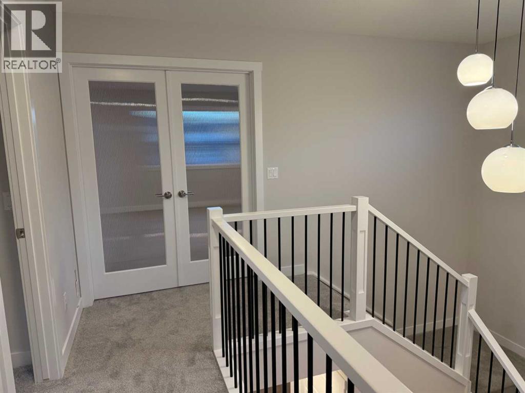 51 Sunrise Heath, Cochrane, Alberta  T4C 3C5 - Photo 34 - A2256885