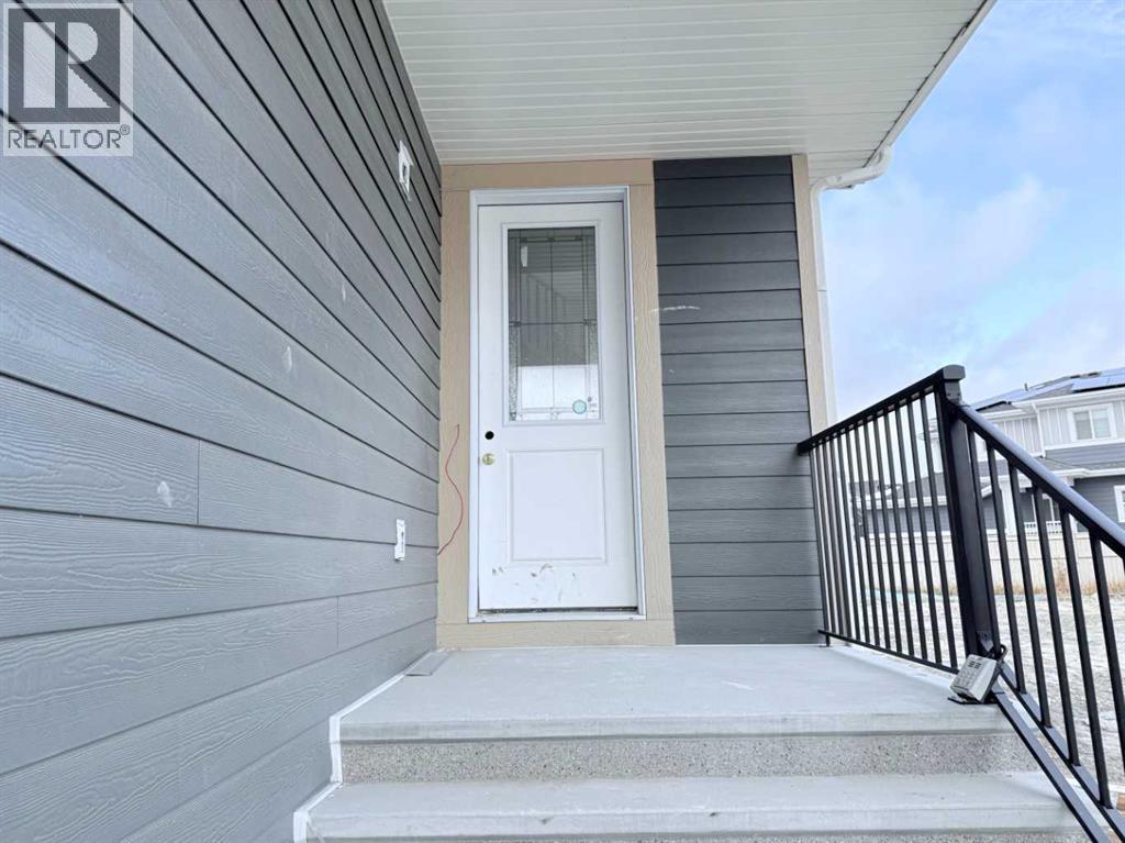 51 Sunrise Heath, Cochrane, Alberta  T4C 3C5 - Photo 2 - A2256885