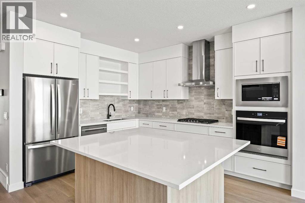 155 Greenwich Drive Nw, Calgary, Alberta  T3B 6N9 - Photo 7 - A2287709