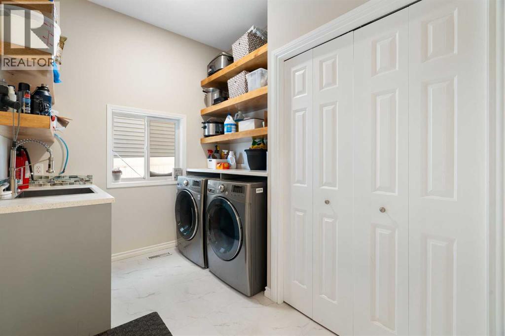 165 Harvest Park Circle Ne, Calgary, Alberta  T3K 4V3 - Photo 34 - A2288251