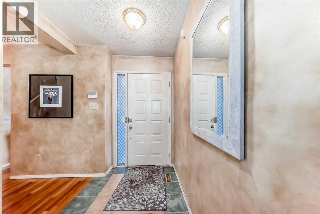 219 Point Mckay Terrace Nw, Calgary, Alberta  T3B 5B6 - Photo 3 - A2274805