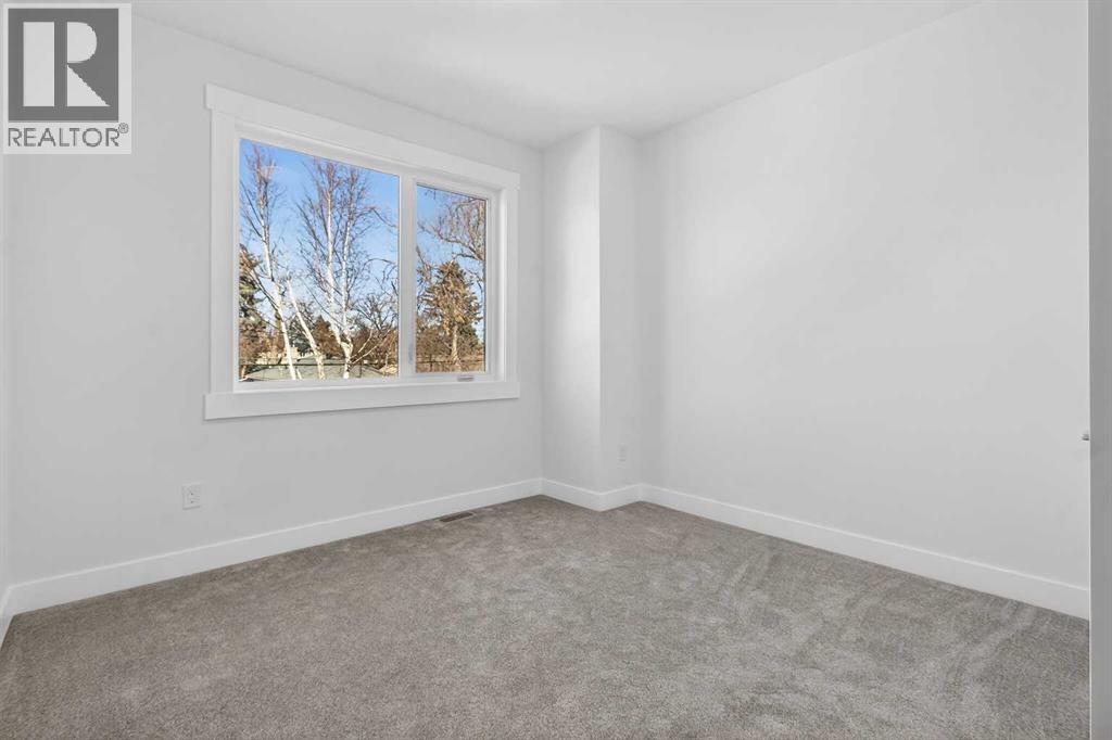 430 33 Avenue Nw, Calgary, Alberta  T2K 0B4 - Photo 27 - A2279604