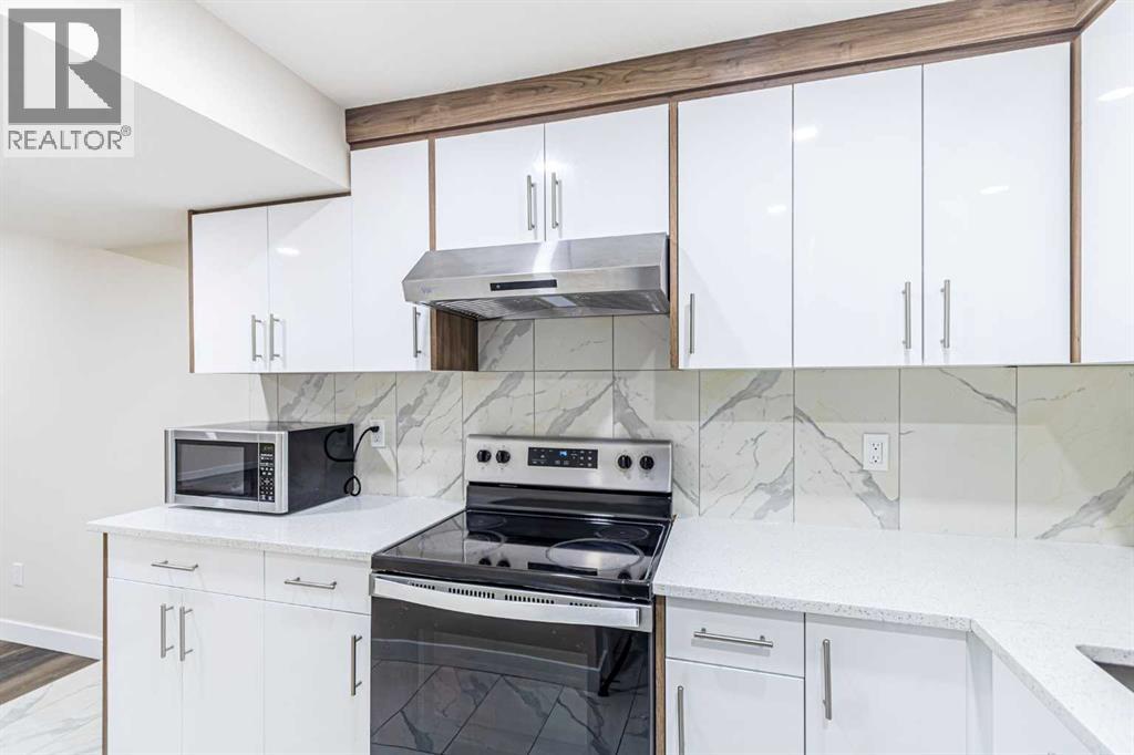 1430 Kings Heights Boulevard Se, Airdrie, Alberta  T4A 0A1 - Photo 36 - A2266274