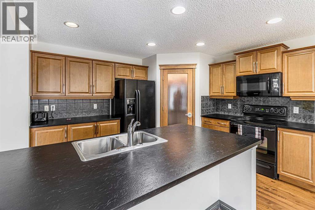 1430 Kings Heights Boulevard Se, Airdrie, Alberta  T4A 0A1 - Photo 16 - A2266274