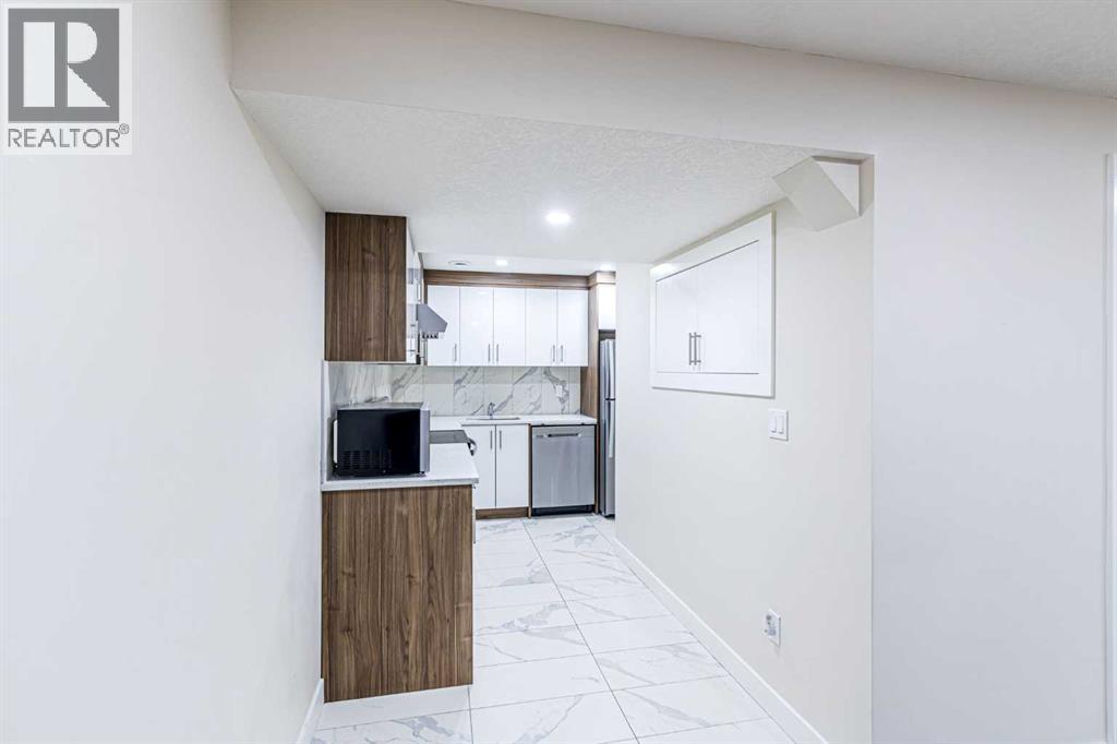 1430 Kings Heights Boulevard Se, Airdrie, Alberta  T4A 0A1 - Photo 34 - A2266274