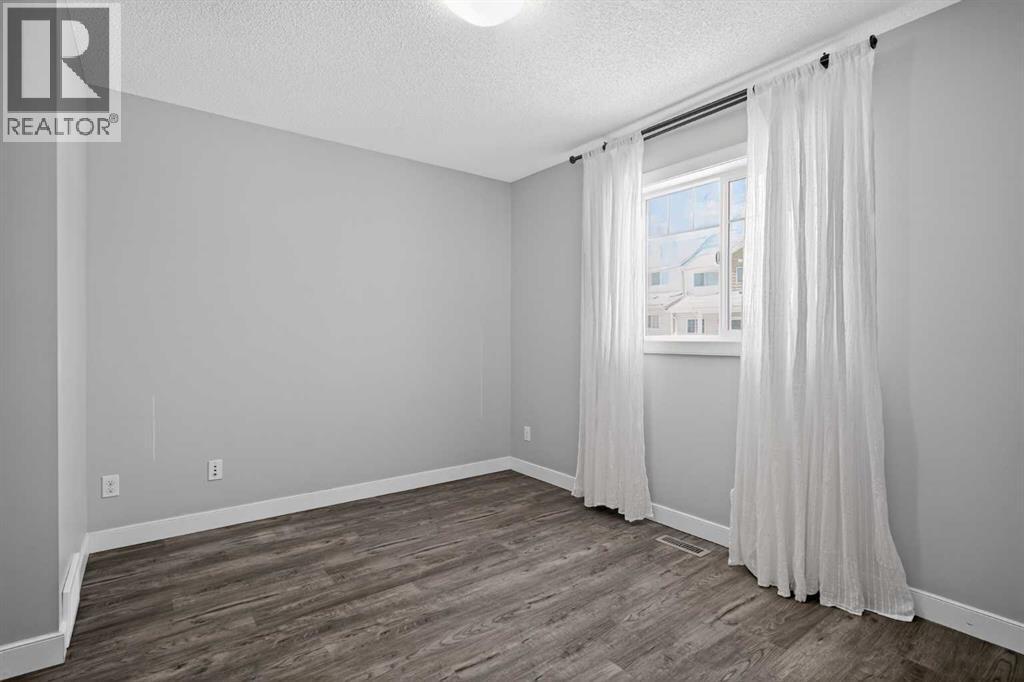 254 Pantego Lane Nw, Calgary, Alberta  T3K 0T1 - Photo 11 - A2288152