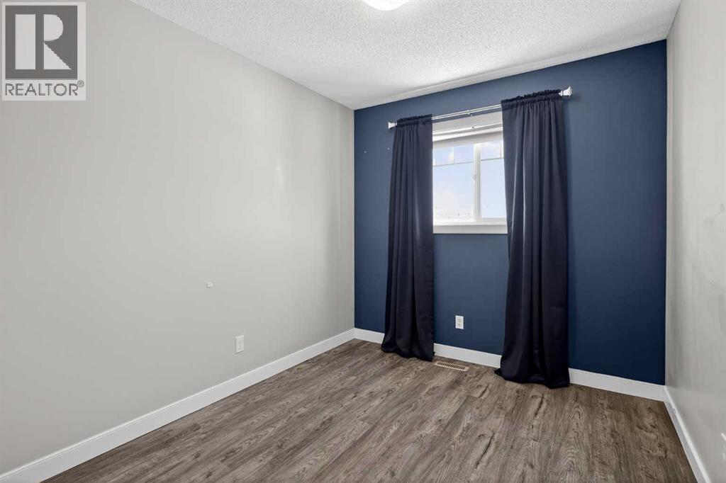 254 Pantego Lane Nw, Calgary, Alberta  T3K 0T1 - Photo 13 - A2288152