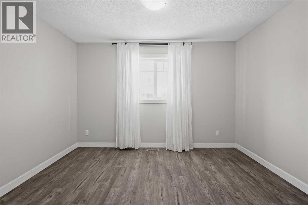 254 Pantego Lane Nw, Calgary, Alberta  T3K 0T1 - Photo 10 - A2288152