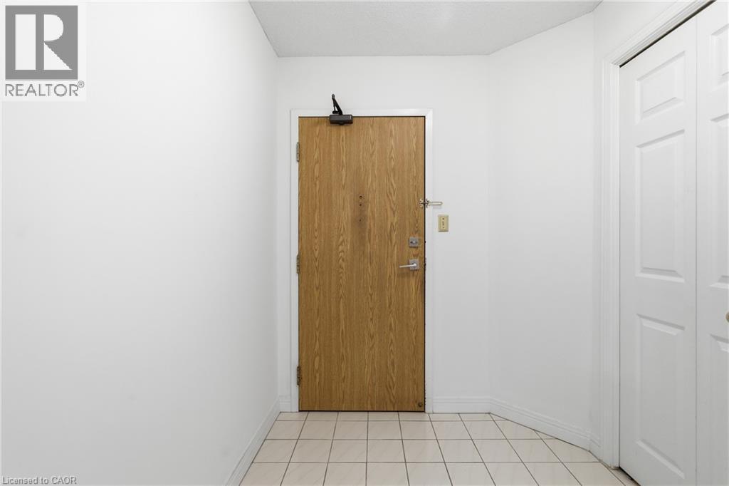 8 Village Green Boulevard Unit# 208, Stoney Creek, Ontario  L8G 5B8 - Photo 5 - 40797717