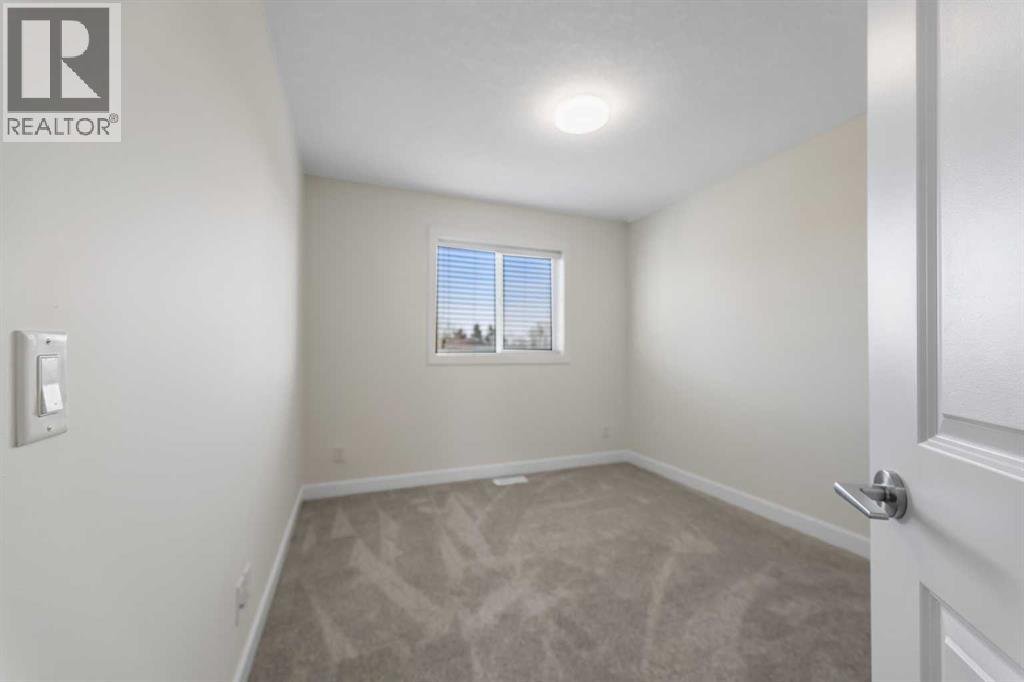 1006 Shantz Place, Crossfield, Alberta  T0M 0S0 - Photo 7 - A2286244