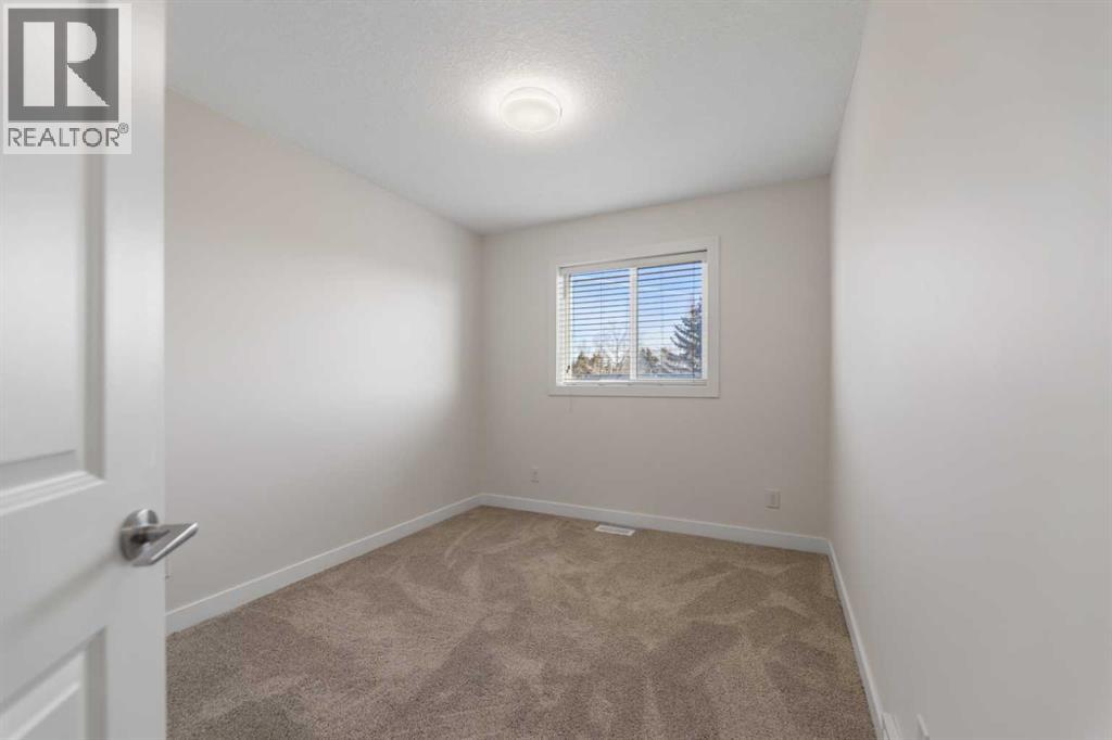 1006 Shantz Place, Crossfield, Alberta  T0M 0S0 - Photo 9 - A2286244