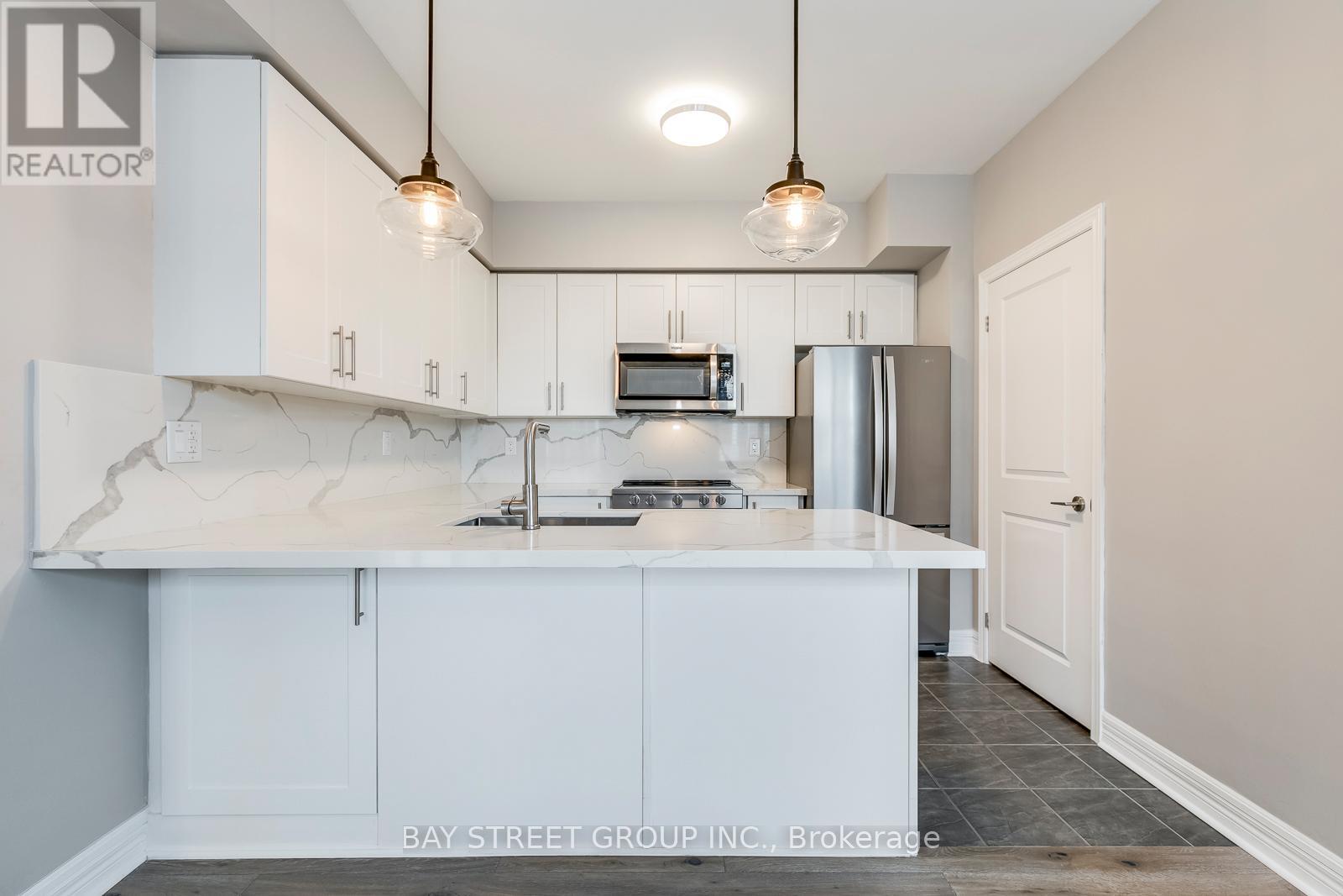 205 - 2326 Taunton Road W, Oakville, Ontario  L6H 0L3 - Photo 10 - W12826230