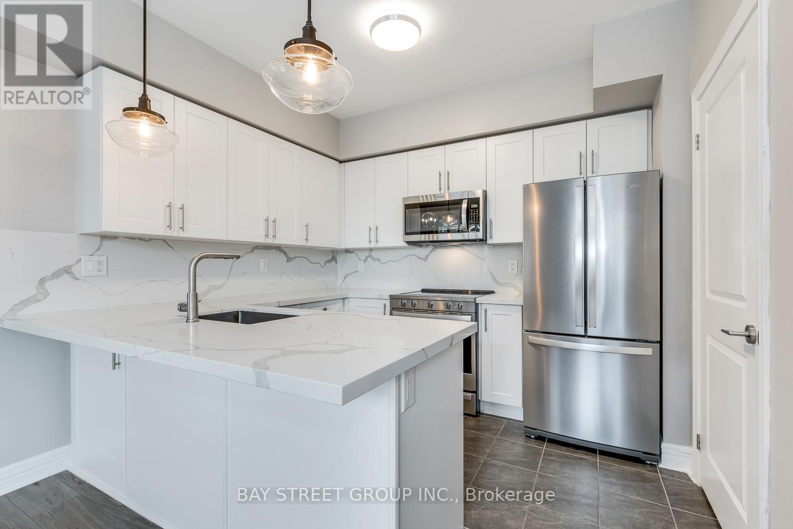 205 - 2326 Taunton Road W, Oakville, Ontario  L6H 0L3 - Photo 11 - W12826230