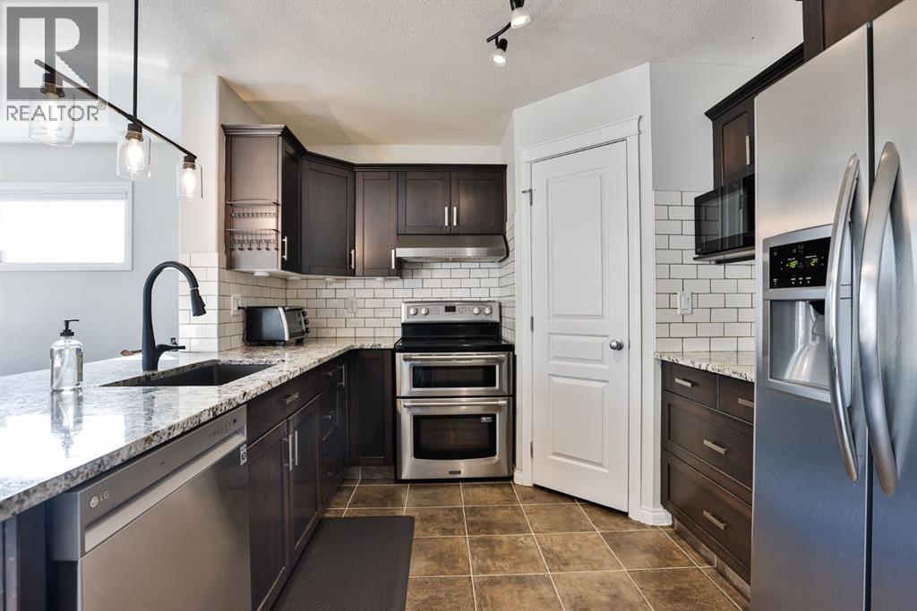 437 Twinriver Road W, Lethbridge, Alberta  T1J 3Y9 - Photo 5 - A2289084