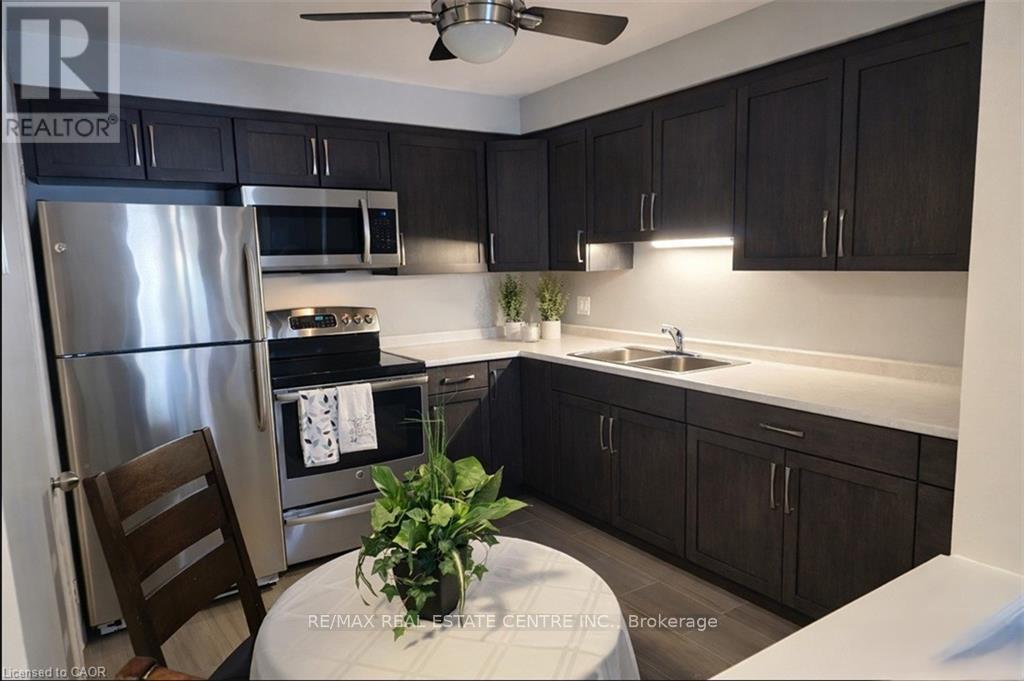 106 - 565 Greenfield Avenue, Kitchener, Ontario  N2C 2P3 - Photo 2 - X12826498