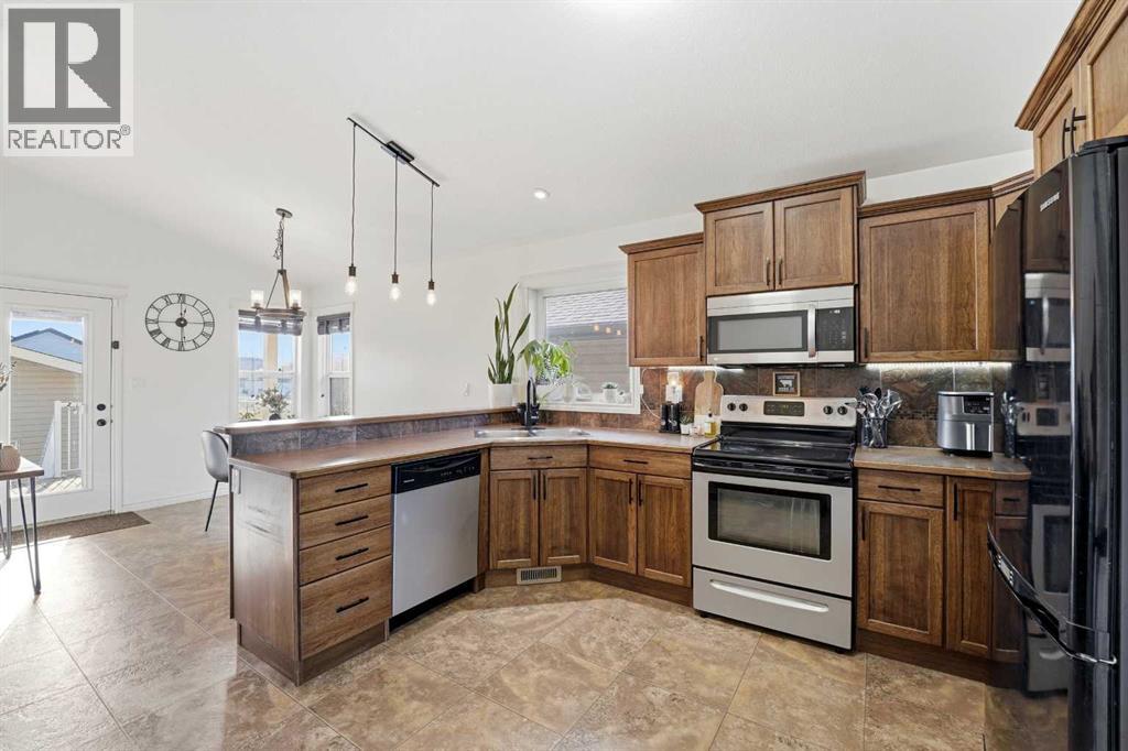 6 Harvest Close, Penhold, Alberta  T0M 1R0 - Photo 11 - A2288523