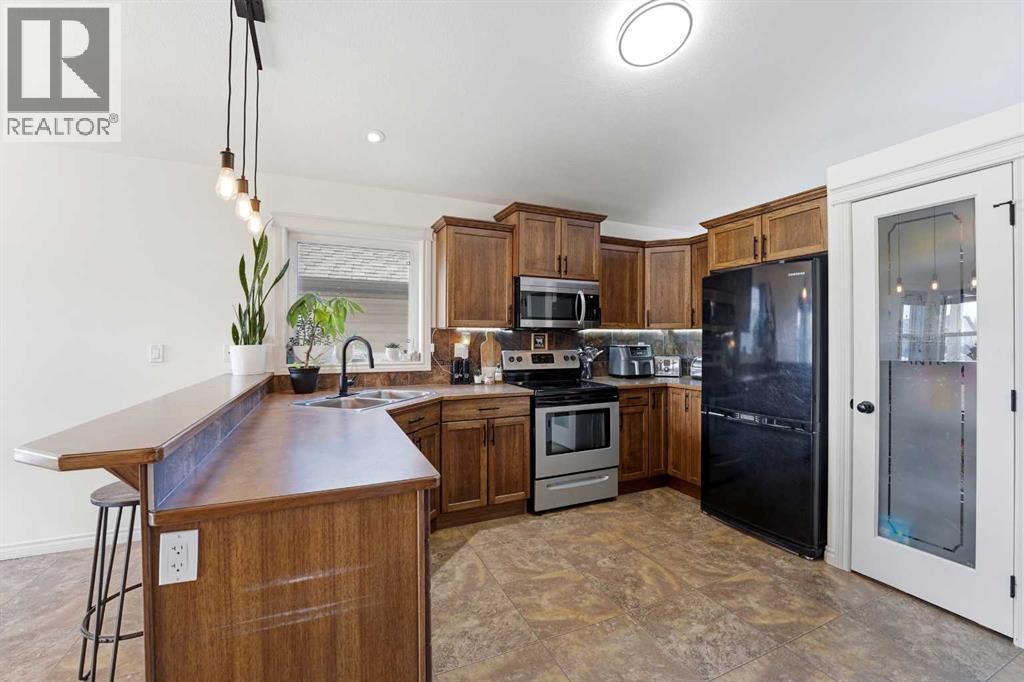 6 Harvest Close, Penhold, Alberta  T0M 1R0 - Photo 9 - A2288523