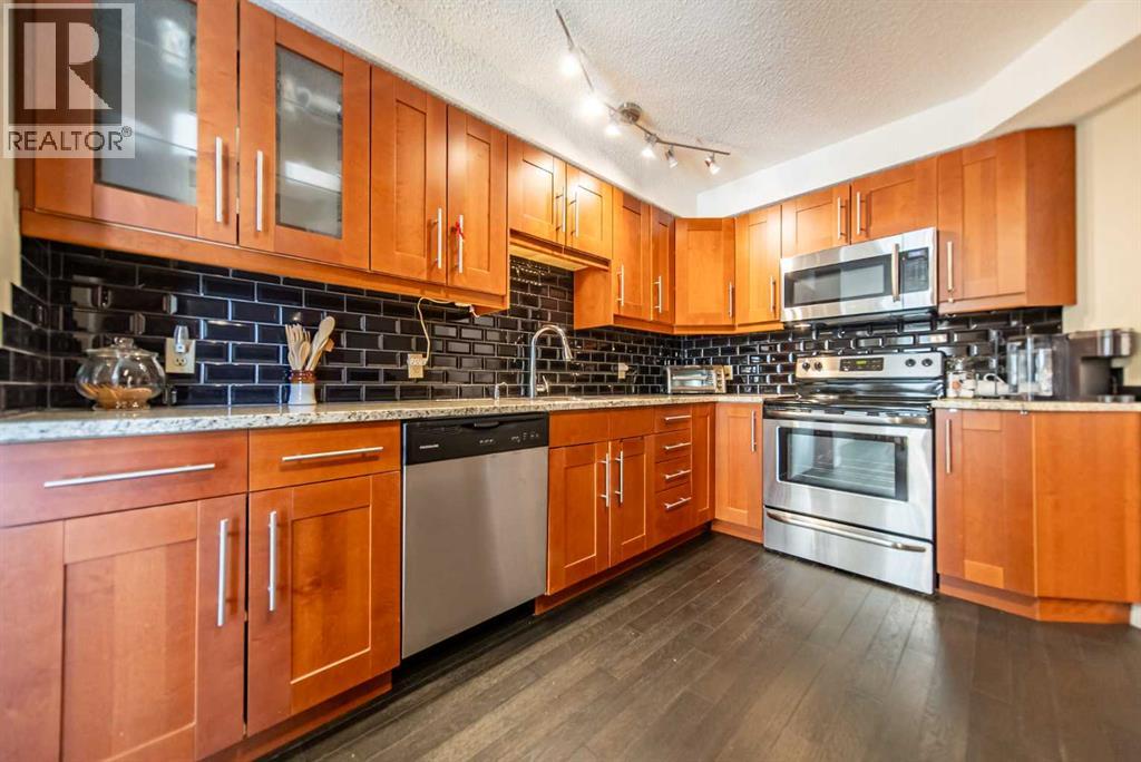 216 Coachway Lane Sw, Calgary, Alberta  T3H 2V9 - Photo 10 - A2288871