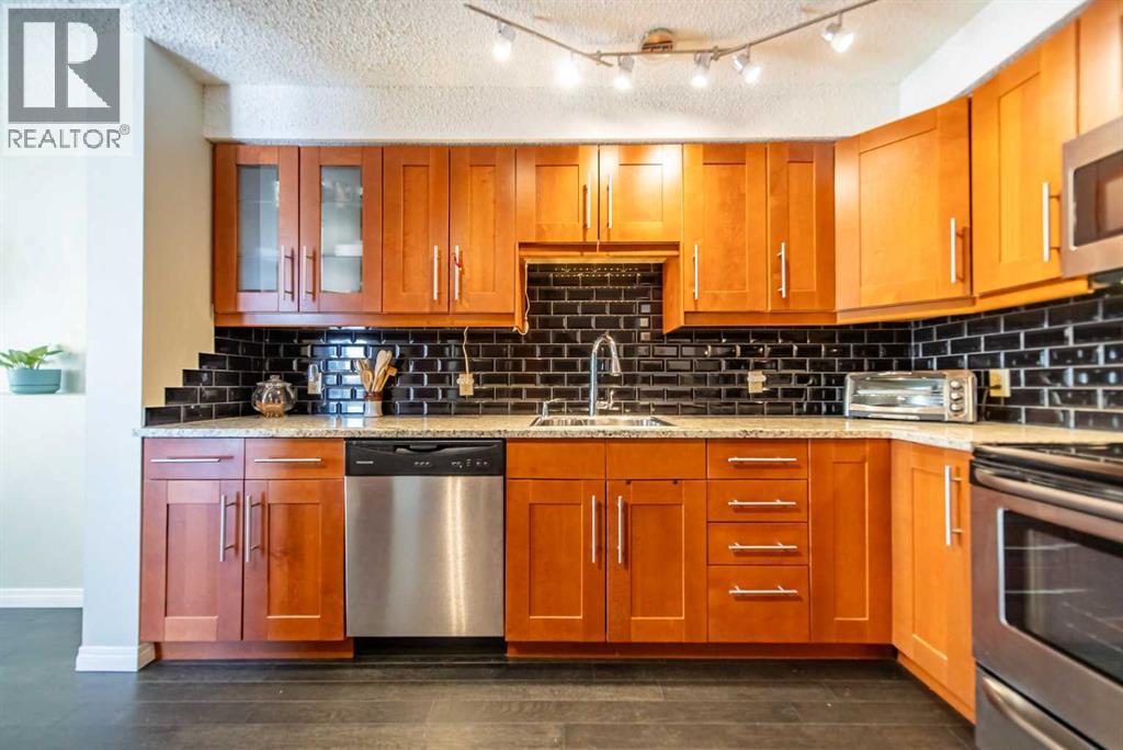 216 Coachway Lane Sw, Calgary, Alberta  T3H 2V9 - Photo 11 - A2288871