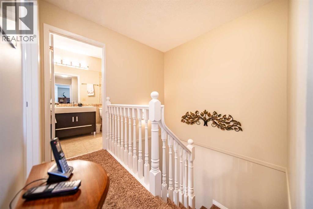 216 Coachway Lane Sw, Calgary, Alberta  T3H 2V9 - Photo 15 - A2288871