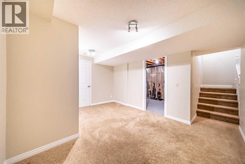 216 Coachway Lane Sw, Calgary, Alberta  T3H 2V9 - Photo 24 - A2288871