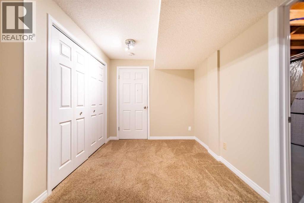 216 Coachway Lane Sw, Calgary, Alberta  T3H 2V9 - Photo 25 - A2288871