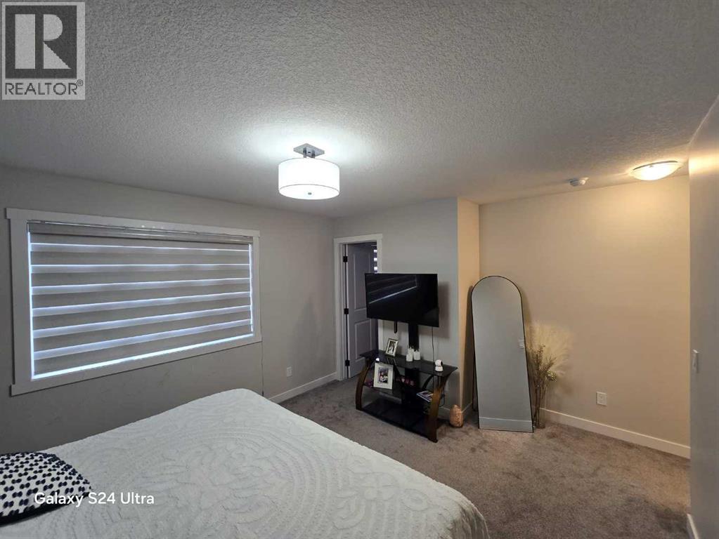 1509 Bayview Point Sw, Airdrie, Alberta  T4B 5K1 - Photo 25 - A2285478
