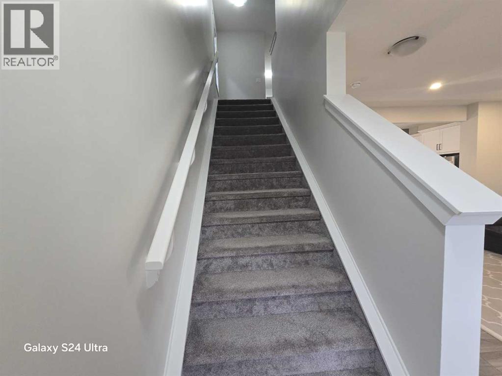 1509 Bayview Point Sw, Airdrie, Alberta  T4B 5K1 - Photo 19 - A2285478