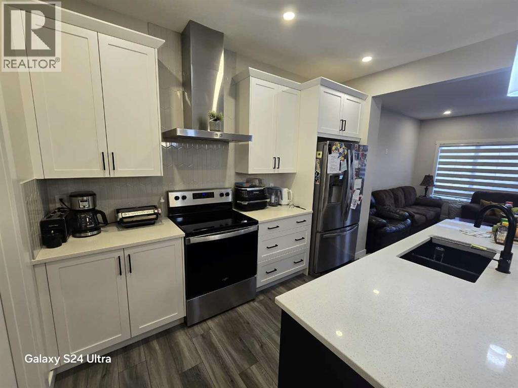 1509 Bayview Point Sw, Airdrie, Alberta  T4B 5K1 - Photo 9 - A2285478