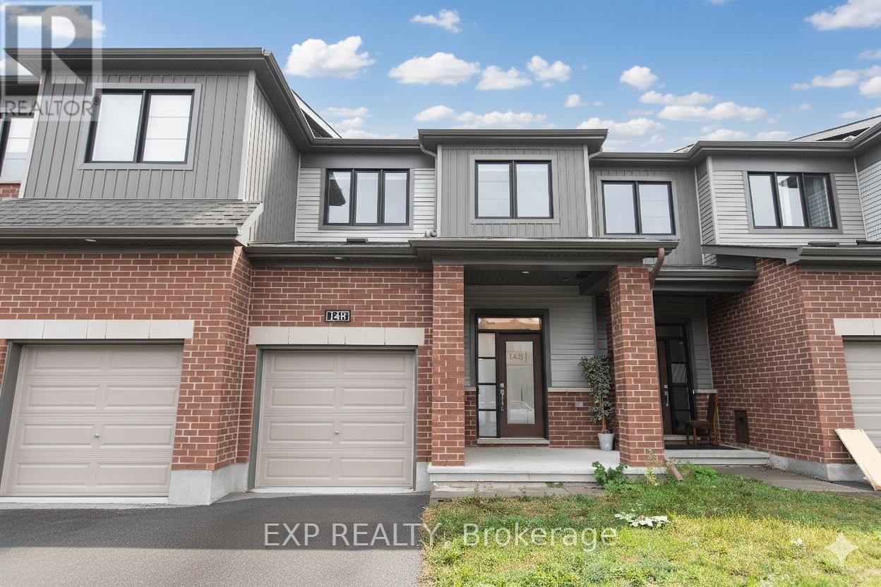Welocme to 148 Namaste Walk! Refined living meets everyday practicality in this beautifully maintained 3-bedroom, 2.5-bath townhome, built just a few years ago and designed for modern lifestyles. The sun-filled main level showcases a contemporary open-concept layout anchored by a striking waterfall island and quartz countertops, creating a seamless space for entertaining and daily living. Upstairs, the thoughtfully placed second-floor laundry adds exceptional convenience, while well-proportioned bedrooms provide comfort and versatility. Ideally positioned within walking distance to École secondaire publique Pierre-de-Blois and the shops, dining, and services of Barrhaven Town Centre, this location encourages a walkable lifestyle. With no direct rear neighbours and open sightlines toward Clarity Park, the home offers a rare balance of community connection and privacy. Book your showing today! (id:48254)