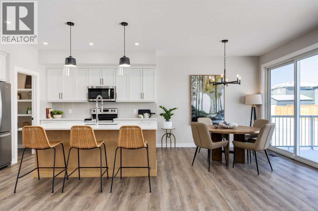 85 Quartz Crescent, Cochrane, Alberta  T4C 3G2 - Photo 4 - A2282373