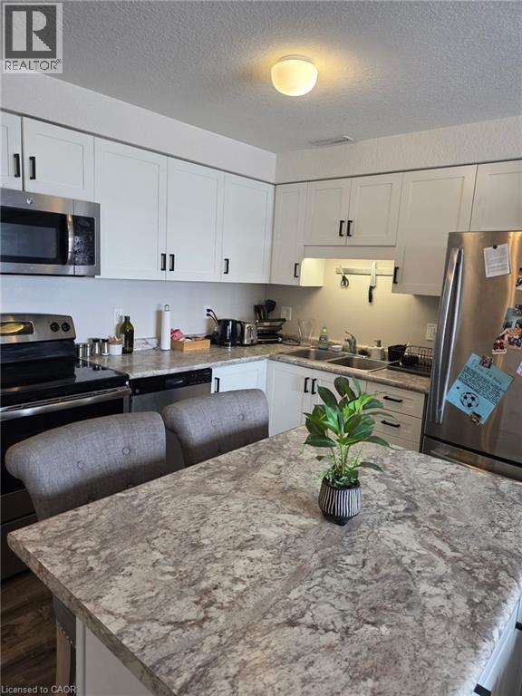 1674 Fischer Hallman Road Unit# E, Kitchener, Ontario N2R 0H9 - Photo 3 - 40807760