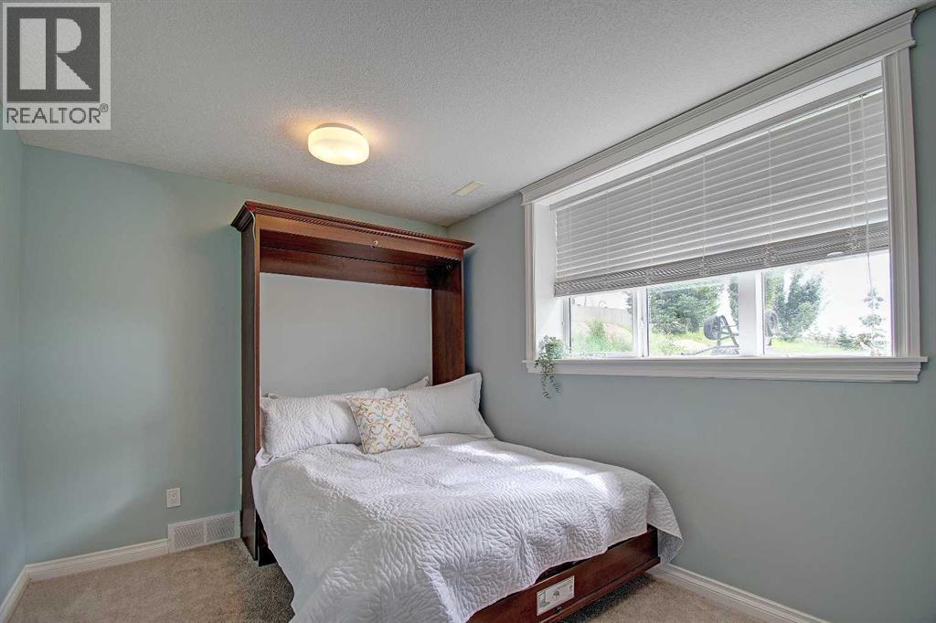 104 Hill Spring Meadows, Rural Rocky View County, Alberta  T4B 2A3 - Photo 31 - A2289131