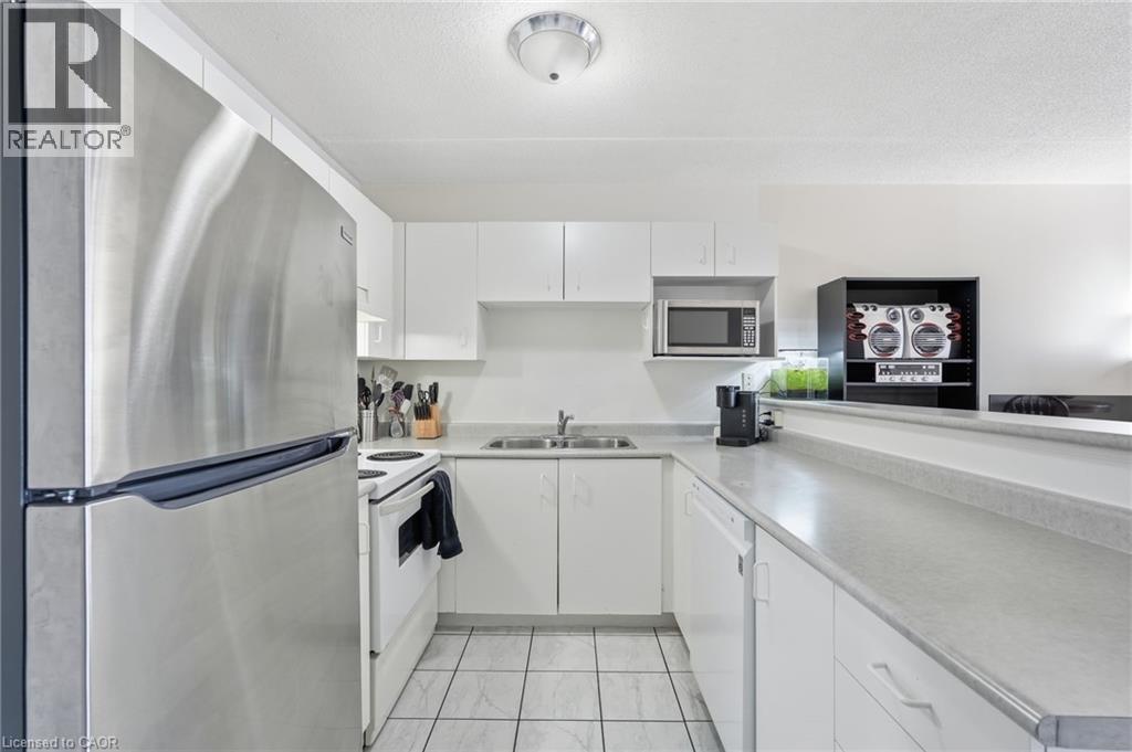 1411 Walkers Line Unit# 213, Burlington, Ontario  L7M 4P5 - Photo 8 - 40806760