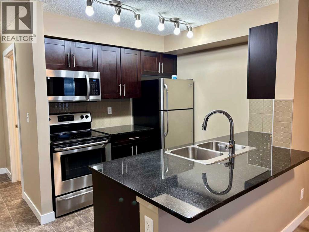 1112, 81 Legacy Boulevard Se, Calgary, Alberta  T2X 2B9 - Photo 5 - A2275721