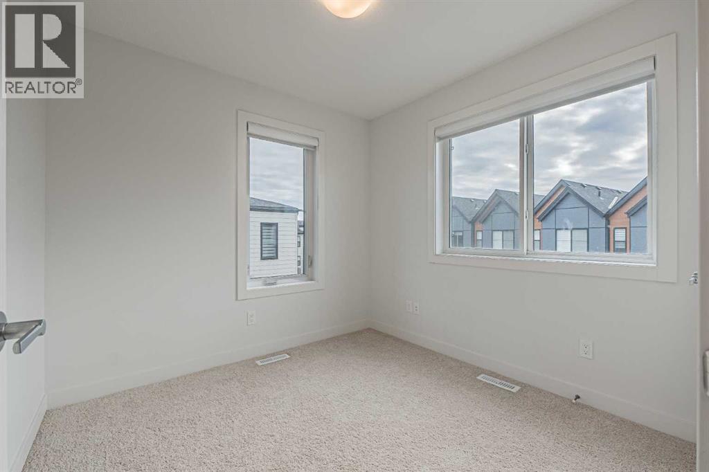 101, 550 Seton Circle Se, Calgary, Alberta  T3K 3Y8 - Photo 6 - A2288364