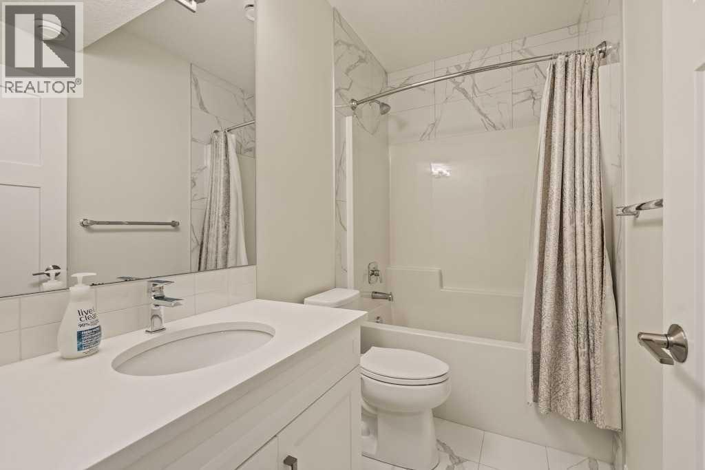 44 Riviera Court, Cochrane, Alberta  T4C 2V8 - Photo 33 - A2288522