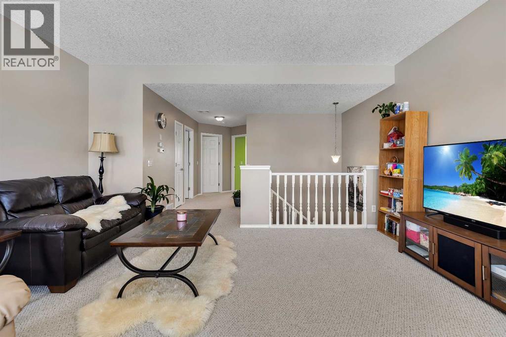 153 Harvest Grove Close Ne, Calgary, Alberta  T3K 4T7 - Photo 11 - A2289105