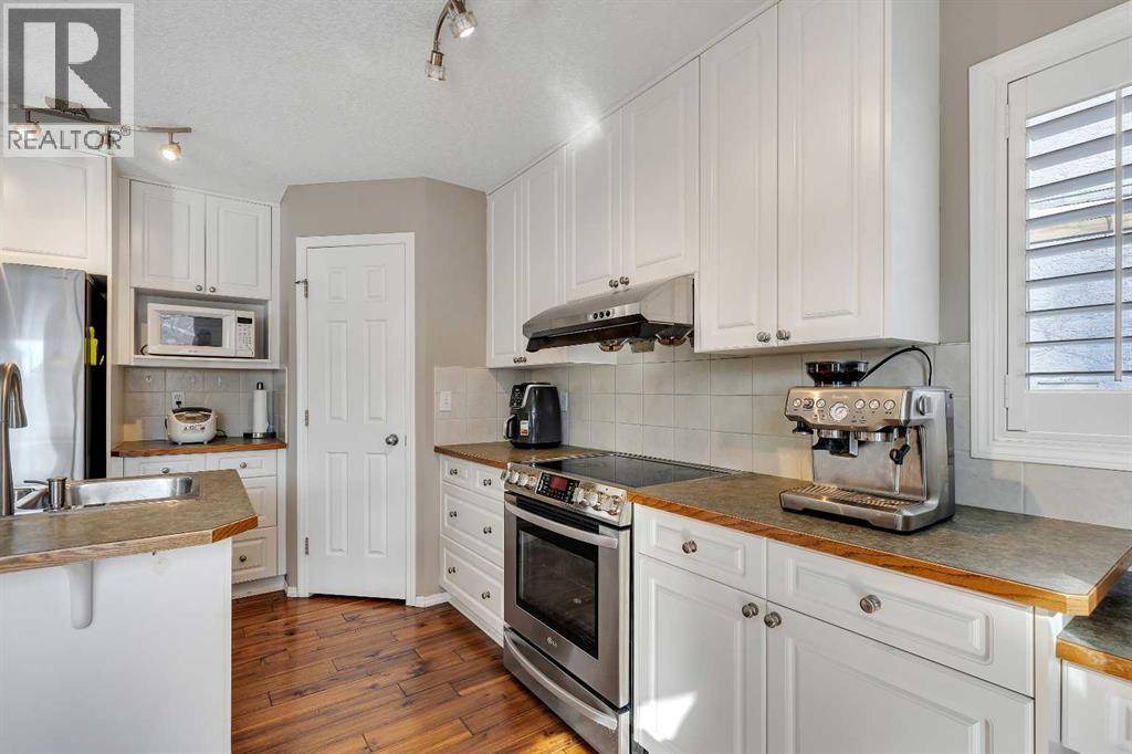 153 Harvest Grove Close Ne, Calgary, Alberta  T3K 4T7 - Photo 7 - A2289105