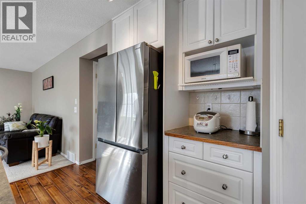 153 Harvest Grove Close Ne, Calgary, Alberta  T3K 4T7 - Photo 6 - A2289105