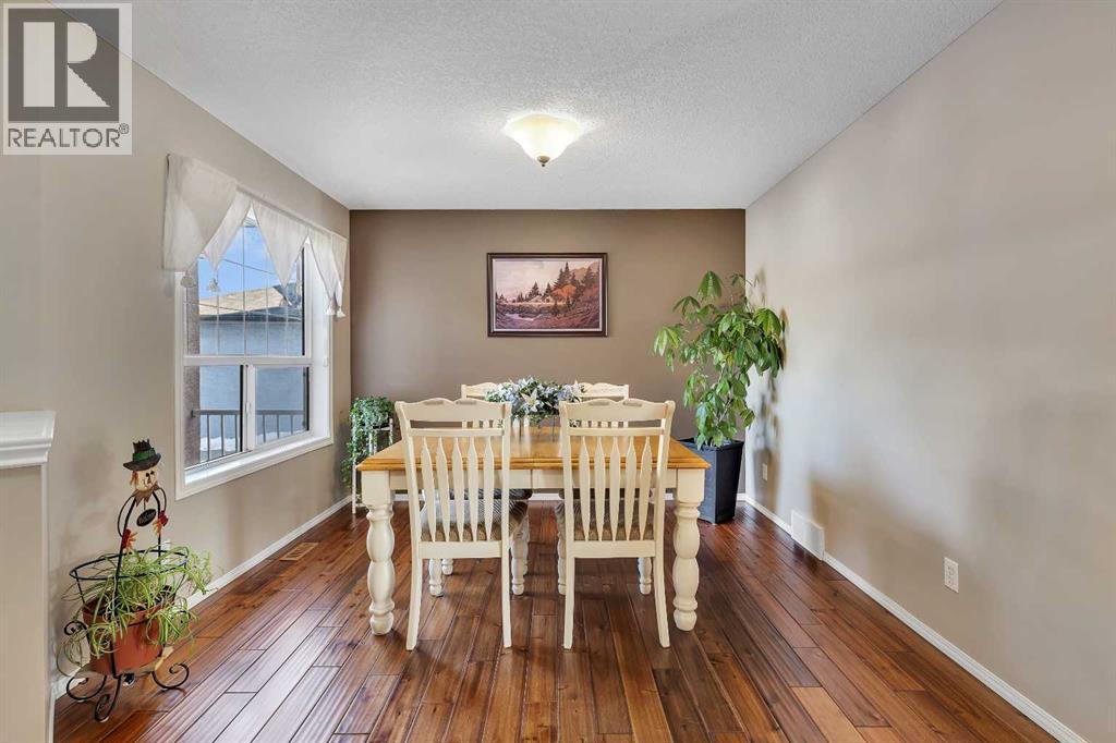 153 Harvest Grove Close Ne, Calgary, Alberta  T3K 4T7 - Photo 3 - A2289105