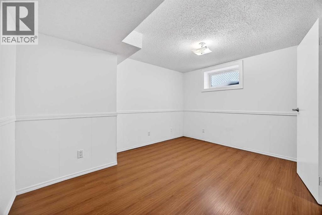 128 Bermuda Drive Nw, Calgary, Alberta  T3K 1H8 - Photo 36 - A2286966