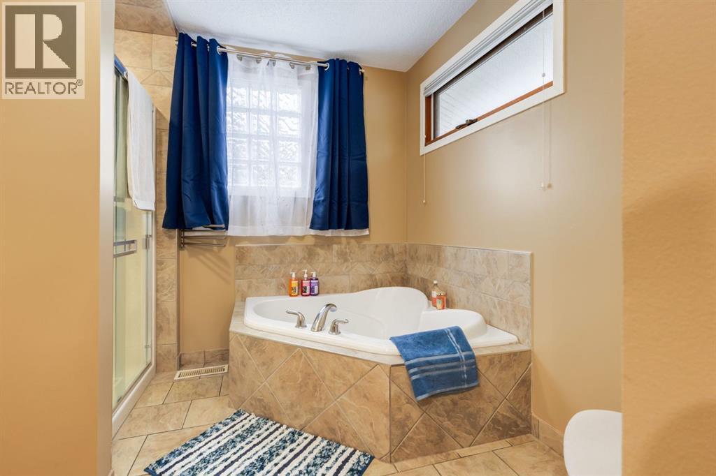 16 Silvercreek Place Nw, Calgary, Alberta  T3B 5A2 - Photo 28 - A2285677