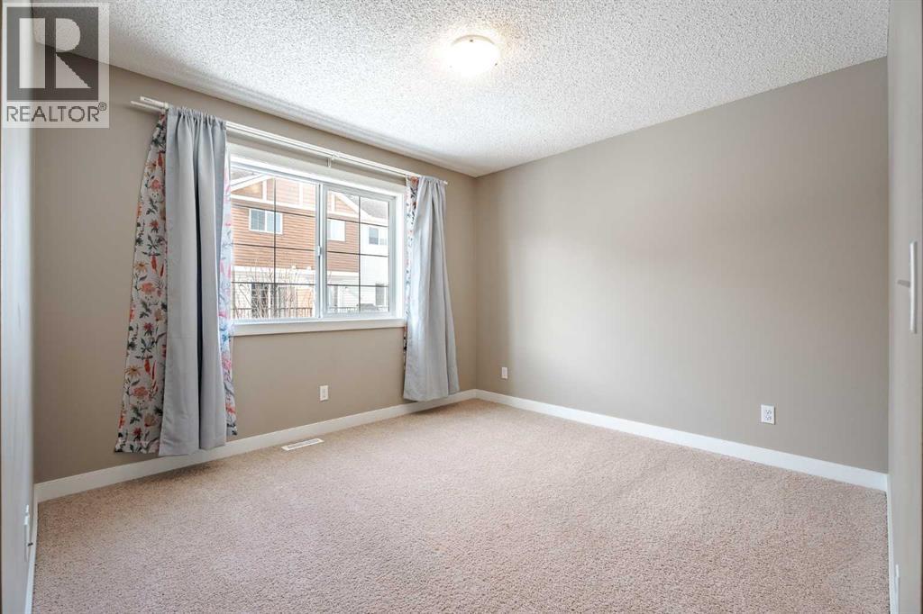 261 Pantego Lane Nw, Calgary, Alberta  T3K 0T1 - Photo 11 - A2286812