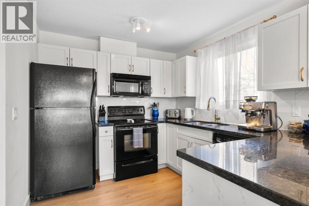 8, 114 Village Heights Sw, Calgary, Alberta  T3H 2L2 - Photo 9 - A2289051