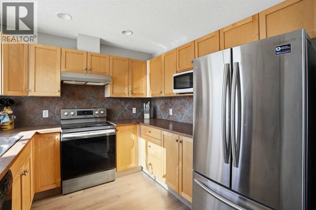 7 Bridleridge Link Sw, Calgary, Alberta  T2Y 4L3 - Photo 9 - A2284256